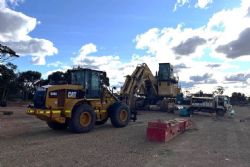 Figure 3: Reassembling the PC2000 excavator on site following transport