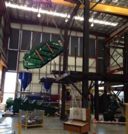 Derrick Screen being fitted to top frame