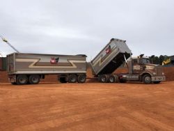 Truck unloading at Bell Bay Port stockpile