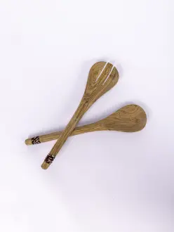 A set of beaded wooden cooking spoons