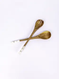 A set of two wooden cooking spoons with artistic detail