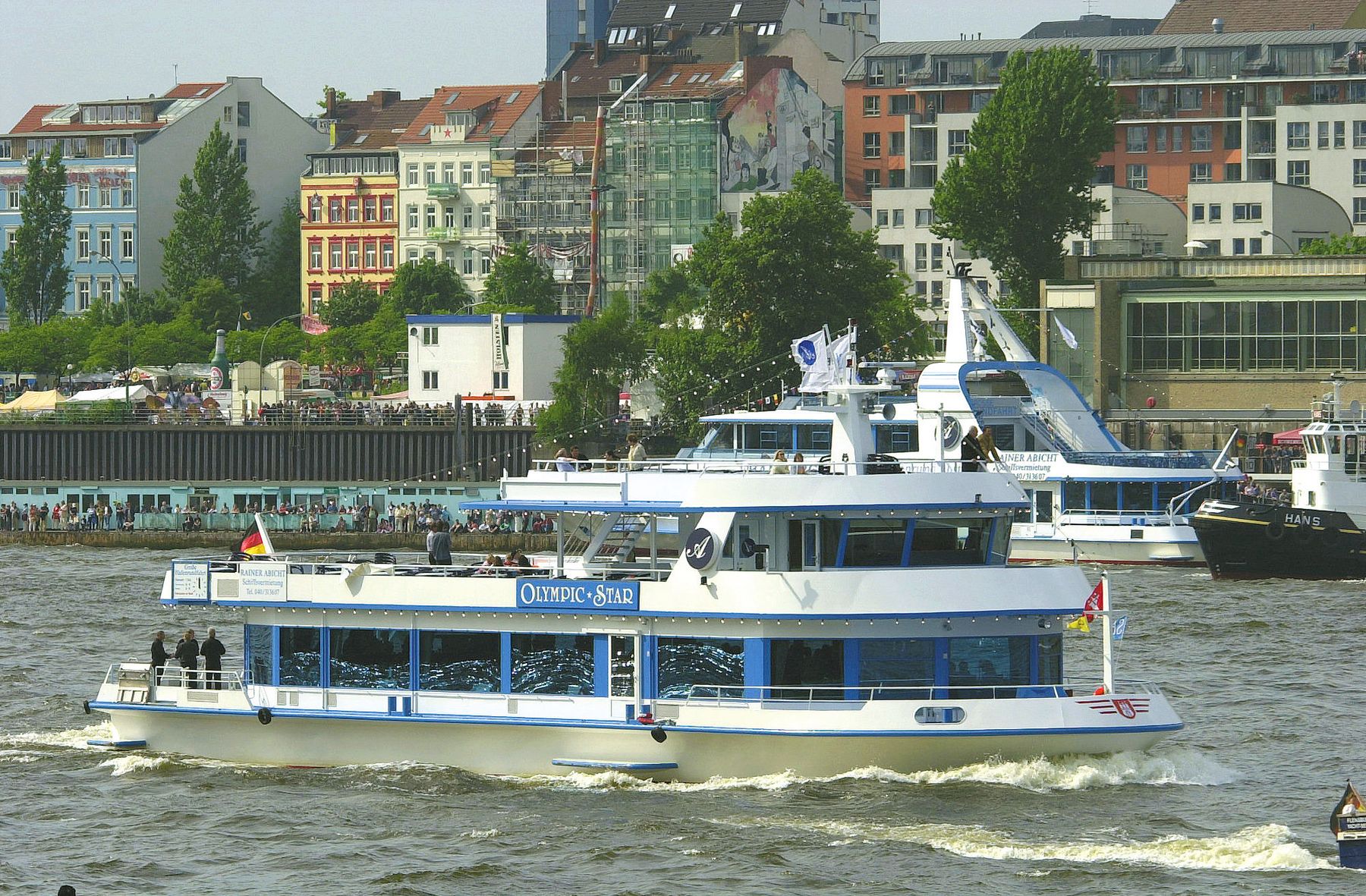 Construction of the passenger ship "MS Olympic Star" with two open decks and a restaurant.