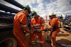 Schlumberger field crew rigging up for Carpentaria-1 fracture stimulation