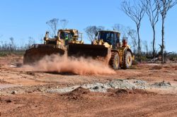 Figure 4: Dozer and Loader commence pushing back top soil at Bulk Sample Pit.