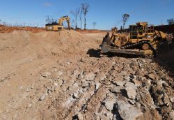 Figure 4: Bulldozer and excavator in pit