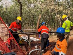 Figure 7: Energold drill crew in process of recovering drill core from the core barrel