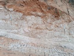 Figure 3 – Channel sample CLD-CHN-006 taken from road cut at entrance of artisanal workings