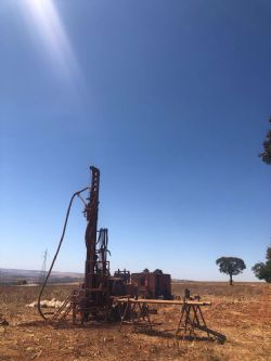 Reverse circulation drill rig