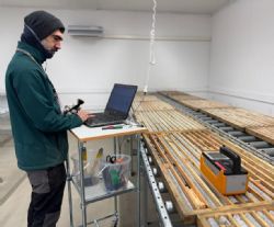 Figure 6: Basin geologist and exploration manager recording key structural details on core