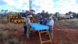 Figure 2. Investors inspecting core at Barrow Creek 1.