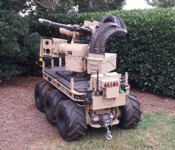 Figure 2: R-400S mounting the ATK M230LF 30 mm cannon. The weapon system is itself mounted on a Northrop Grumman CaMEL military robot.