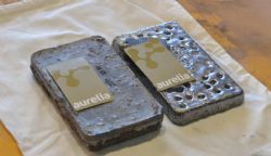 Both bars are white coloured owing to the silver content