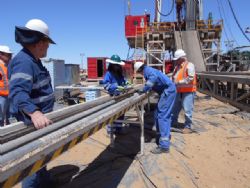Figure 3: Andy Whittle (Chairman) far right and Mike Herrington (COO) far left observe first core at Gaudi-1