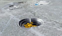 Figure 1. Pearse optimised pit looking southeast toward the Mineral Hill processing plant