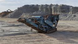 Impactor crusher that will be used to crush the soft high grade ore in the large stockpile in the background.