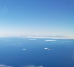 Open water against the East coast of Greenland allowing open shipping access direct to the project site