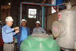 The Honourable Minister viewing Prospect's lithium carbonate pilot plant with General Manager Lee John and Examix Director Paul Chimbodza