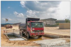 Vehicle wash down bay with sediment control