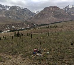Diamond drill rig set-up 2km west of the WTF deposit, looking south towards Red Mountain.