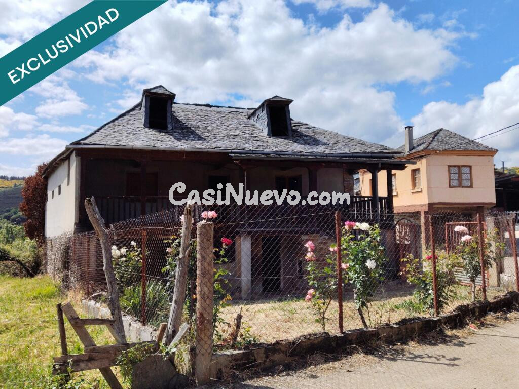 Gran casa de piedra para reformar con huerto y jardn