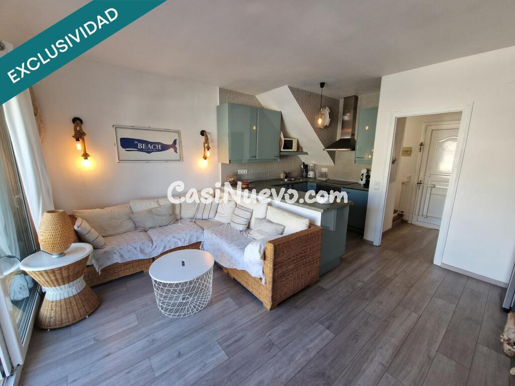 Casa al canal con amarre y garaje