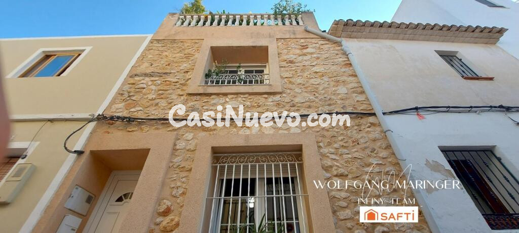 Casa familiar histórica modernizada en el corazón de Pedreguer