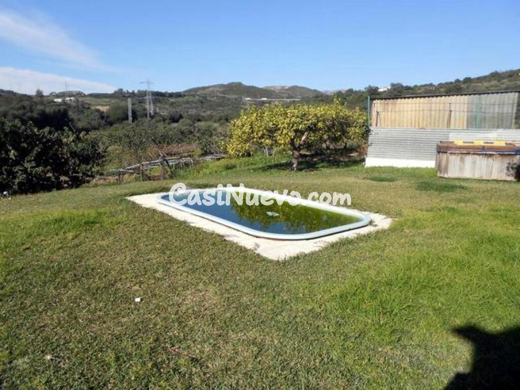 CASA Y FINCA EN UN ENTORNO PARADISIACO