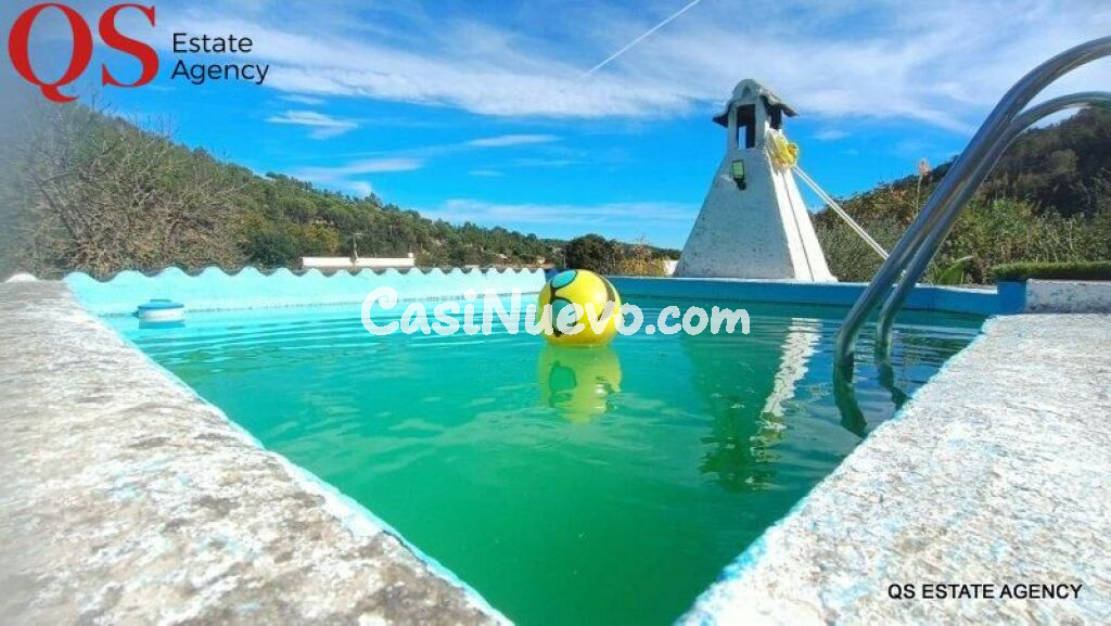 Casa con piscina y amplio jardin en urbanización Riu Clar, Massanes
