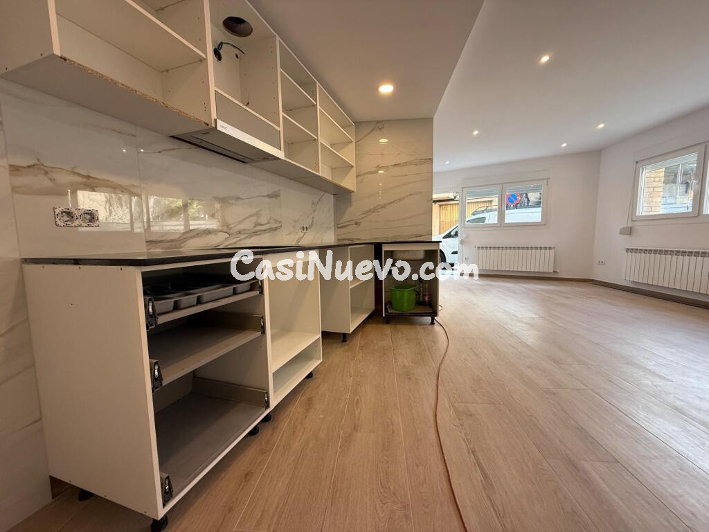 AMPLIA PLANTA BAJA TOTALMENTE REFORMADA EN VIC