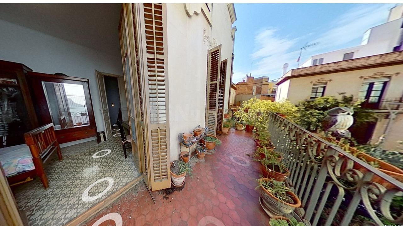 Exclusiva vivienda con jardín en el centro de Sant Feliu de Llobregat.