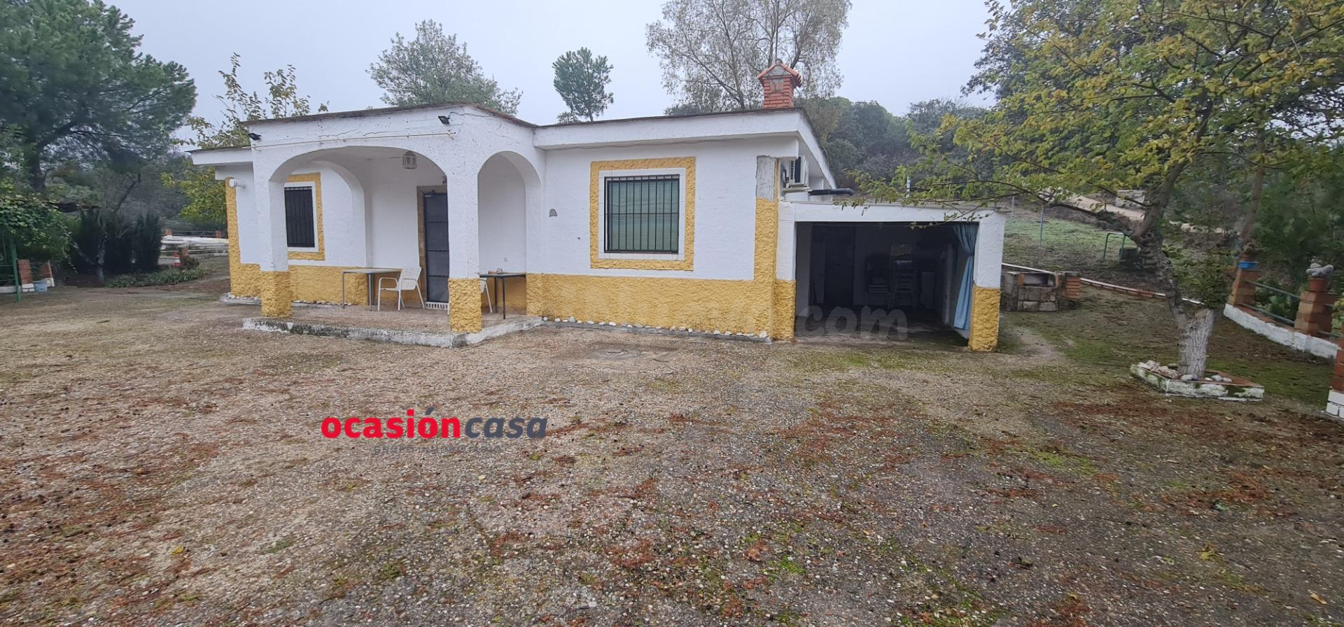 PARCELA CON CASA Y PISCINA A LA VENTA