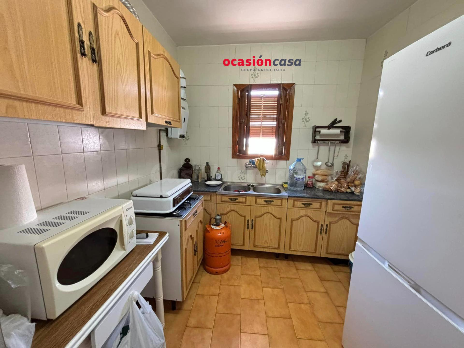 CASA CON COCHERA Y TERRENO A LA VENTA - foto 4