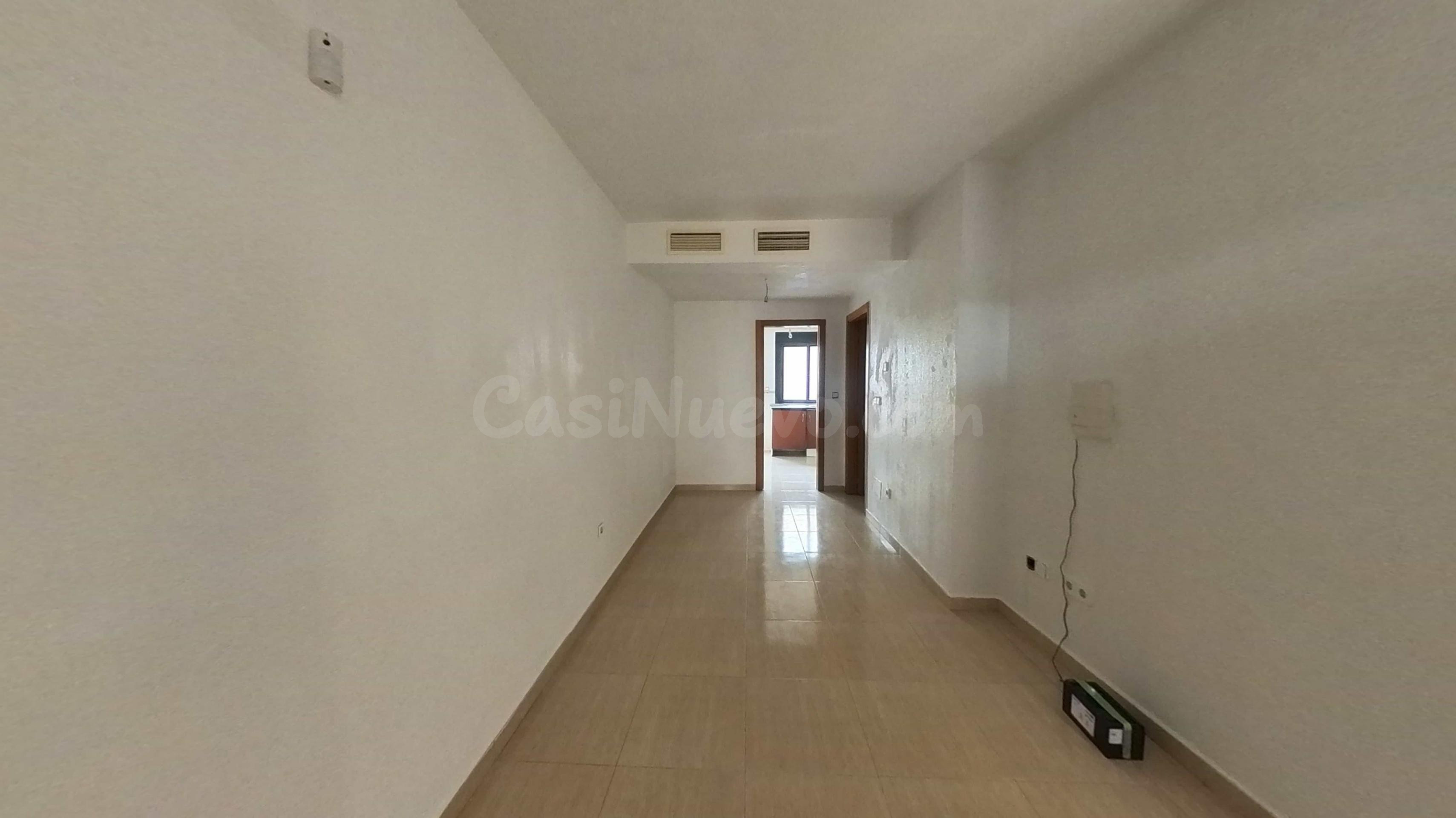 VIVIENDA ADOSADA DE 2 DORM EN ROLDAN