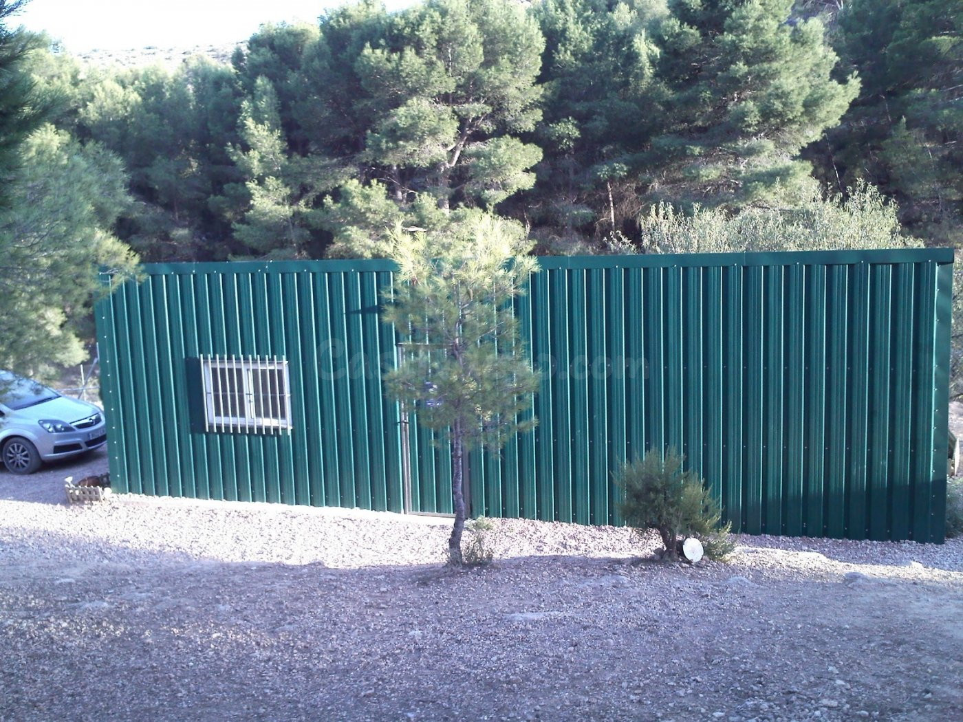 terreno rural con casa prefablicada