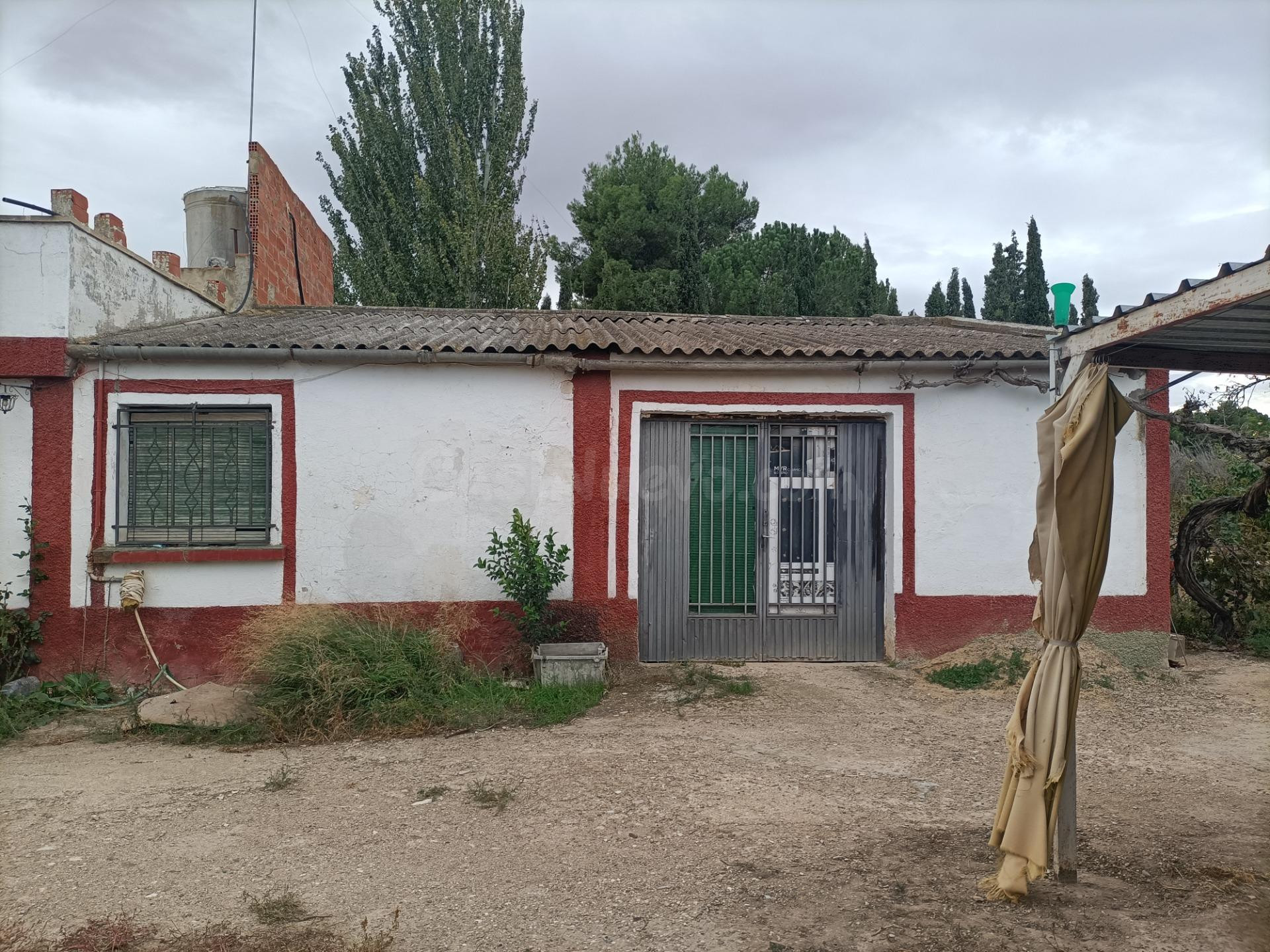 SE VENDE TERRENO CON VIVIENDA EN LA CHAMA BELCHITE