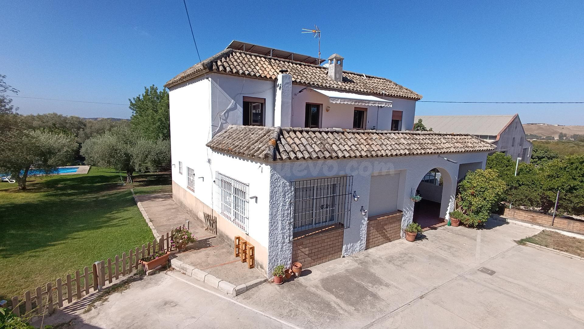 PRECIO NEGOCIABLE! ADQUIERA UNA PARCELA CON VIVIENDA Y NEGOC