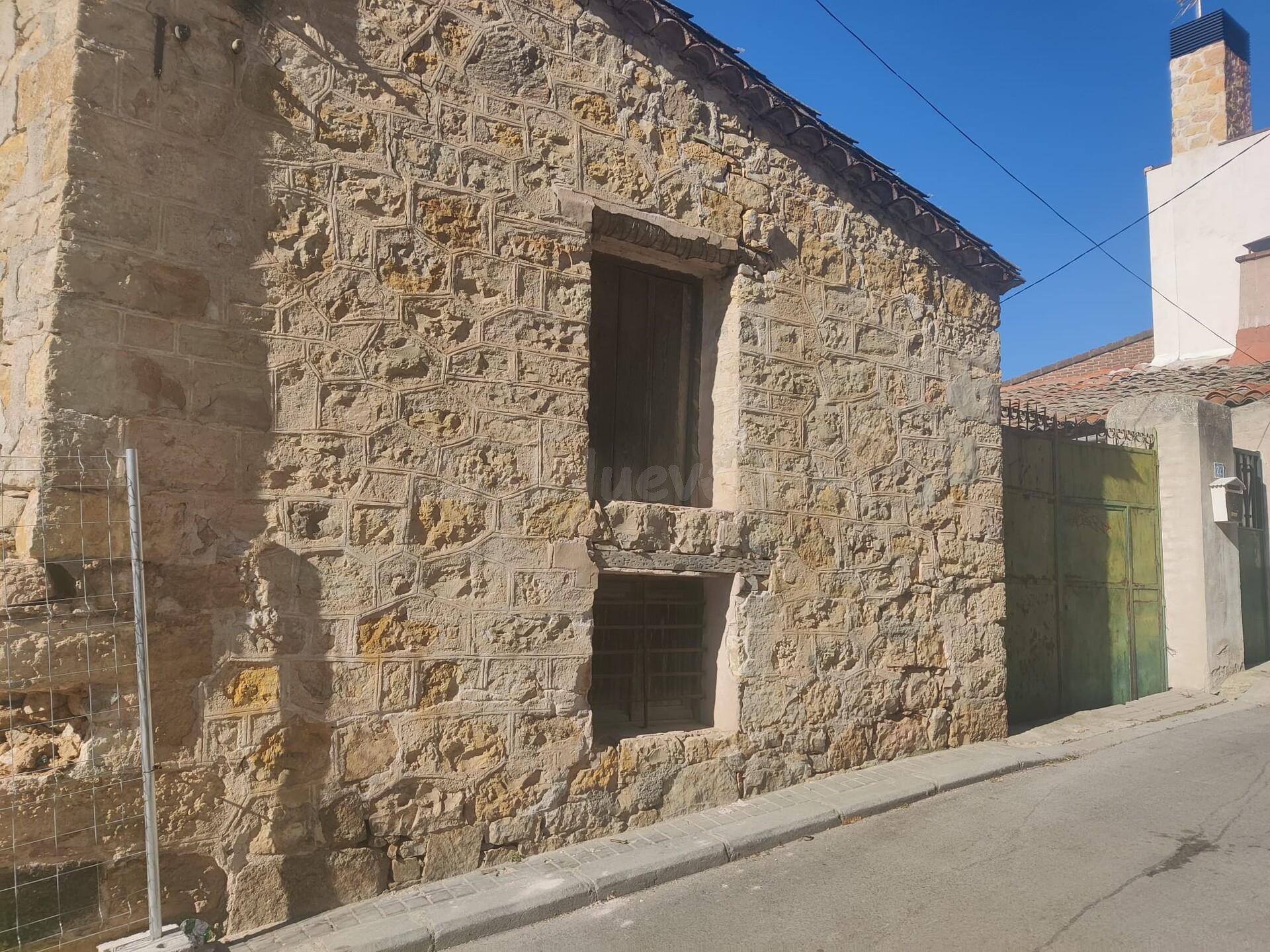 Venta de casa de piedra en El Molar
