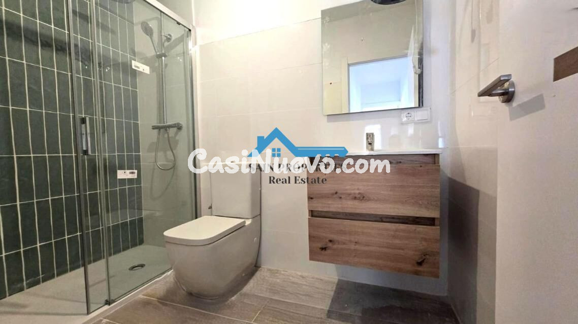 Bajo de 2 dormitorios totalmente reformado a estrenar en el  - foto 4