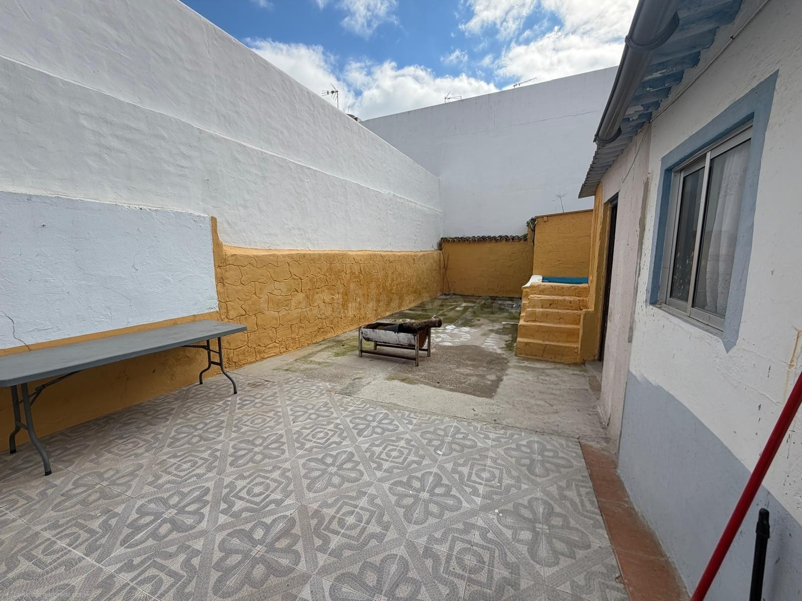 Casa con gran patio y piscina de obra en Santiponce – amplit