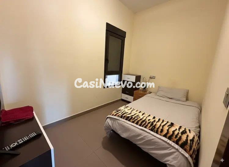 Céntrico piso de dos dormitorios y dos baños para invertir e - foto 5