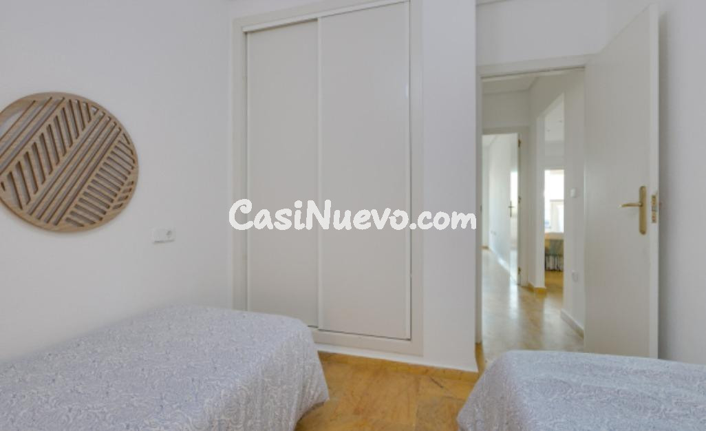 APARTAMENTO DE 2 DORMITORIOS 1 BAÑO, GARAJE TRASTERO EN AGUA - foto 8