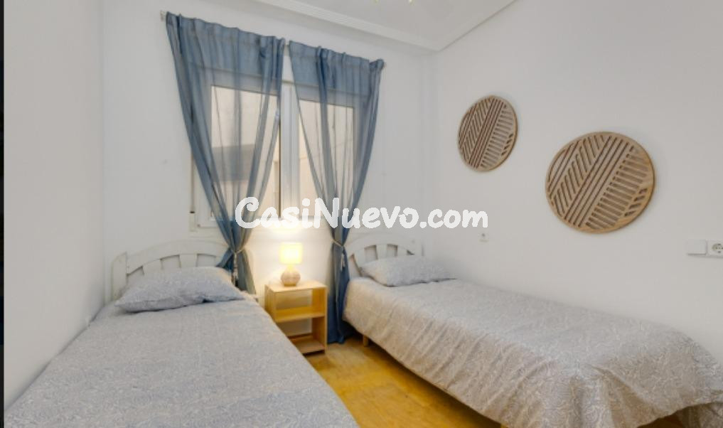 APARTAMENTO DE 2 DORMITORIOS 1 BAÑO, GARAJE TRASTERO EN AGUA - foto 9