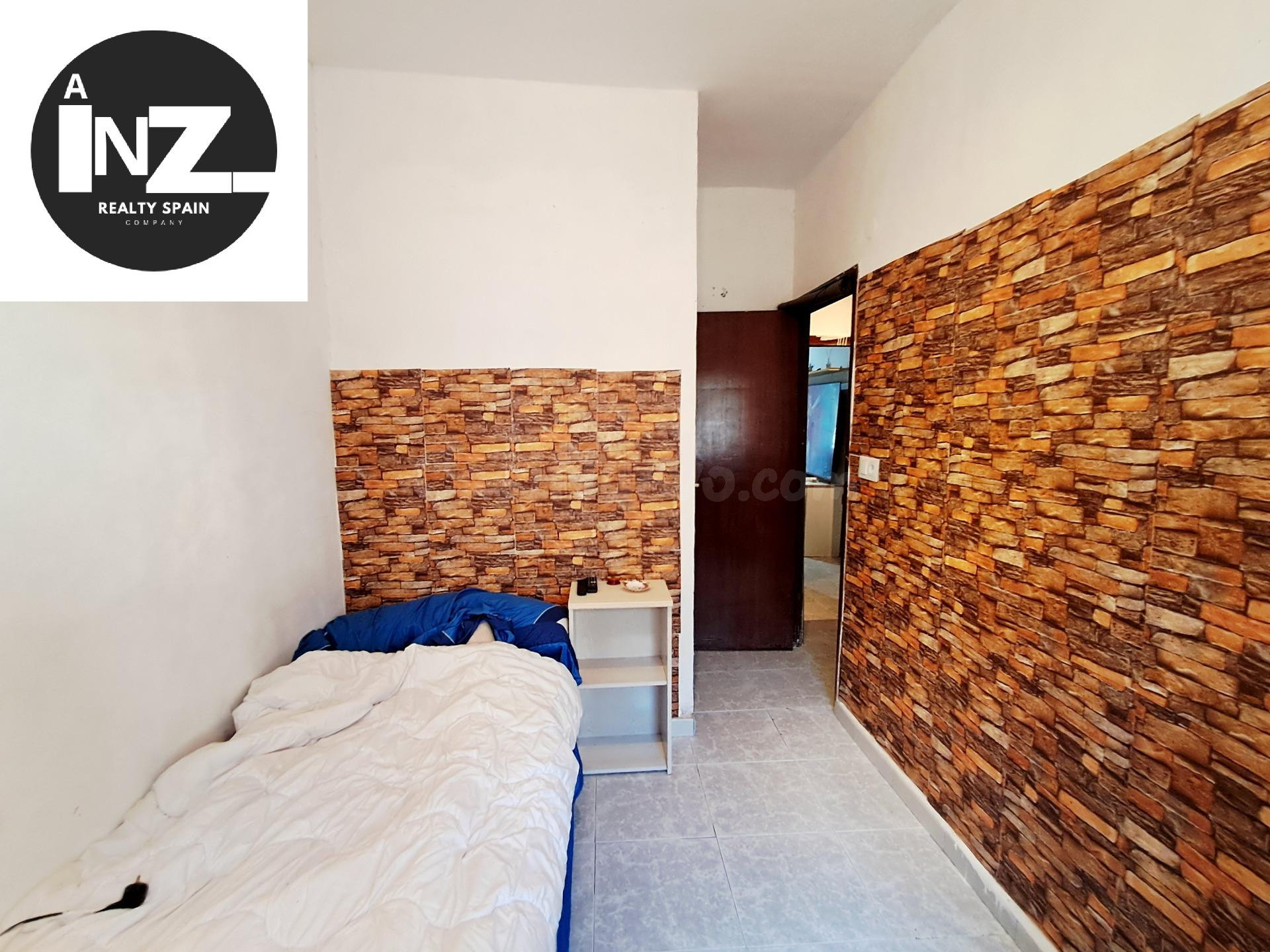 Vivienda en planta baja para reformar de 3 dormitorios junto