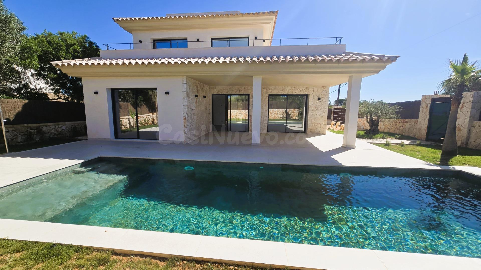 Exclusiva villa de diseño con piscina privada en Cala Llomba - foto 3