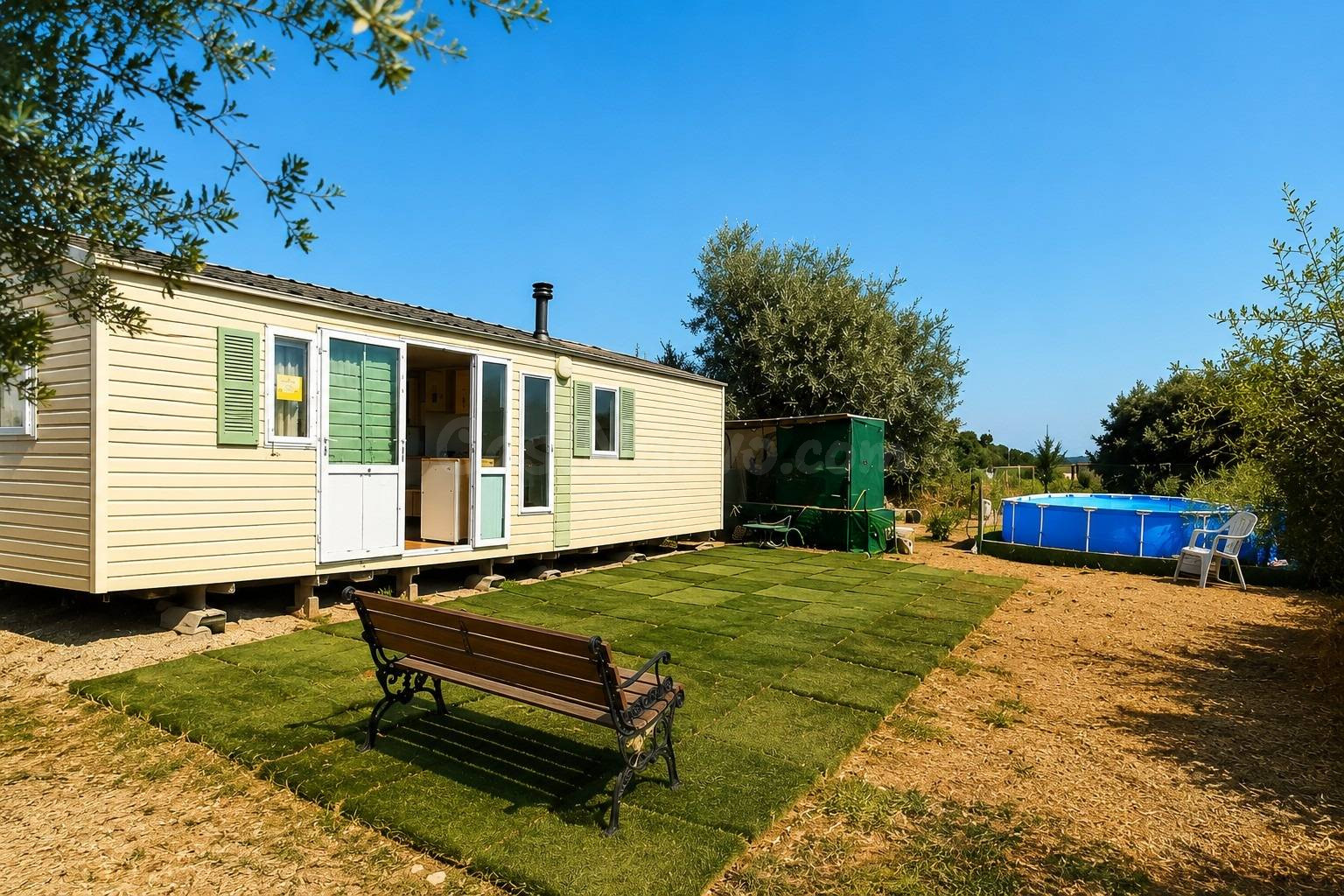 PARCELA RÚSTICA DE 500 m2 CON MOBILE HOME Y PISCINA EN DOS HERMANAS