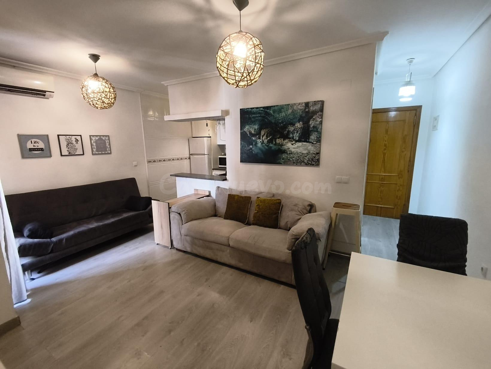 SE ALQUILA POR LARGO TIEMPO APARTAMENTO DE 2 DORMITORIOS 1 B - foto 2