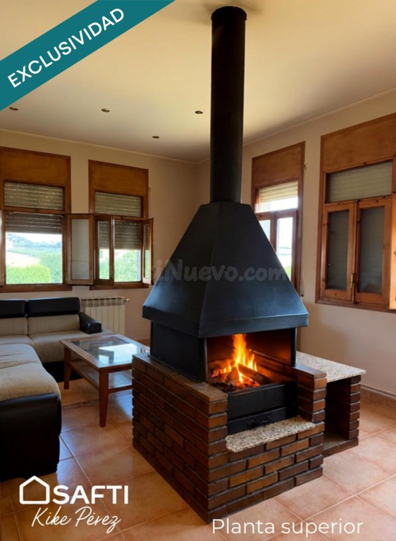 Una casa, 2 espacios adaptados, garaje y terreno.