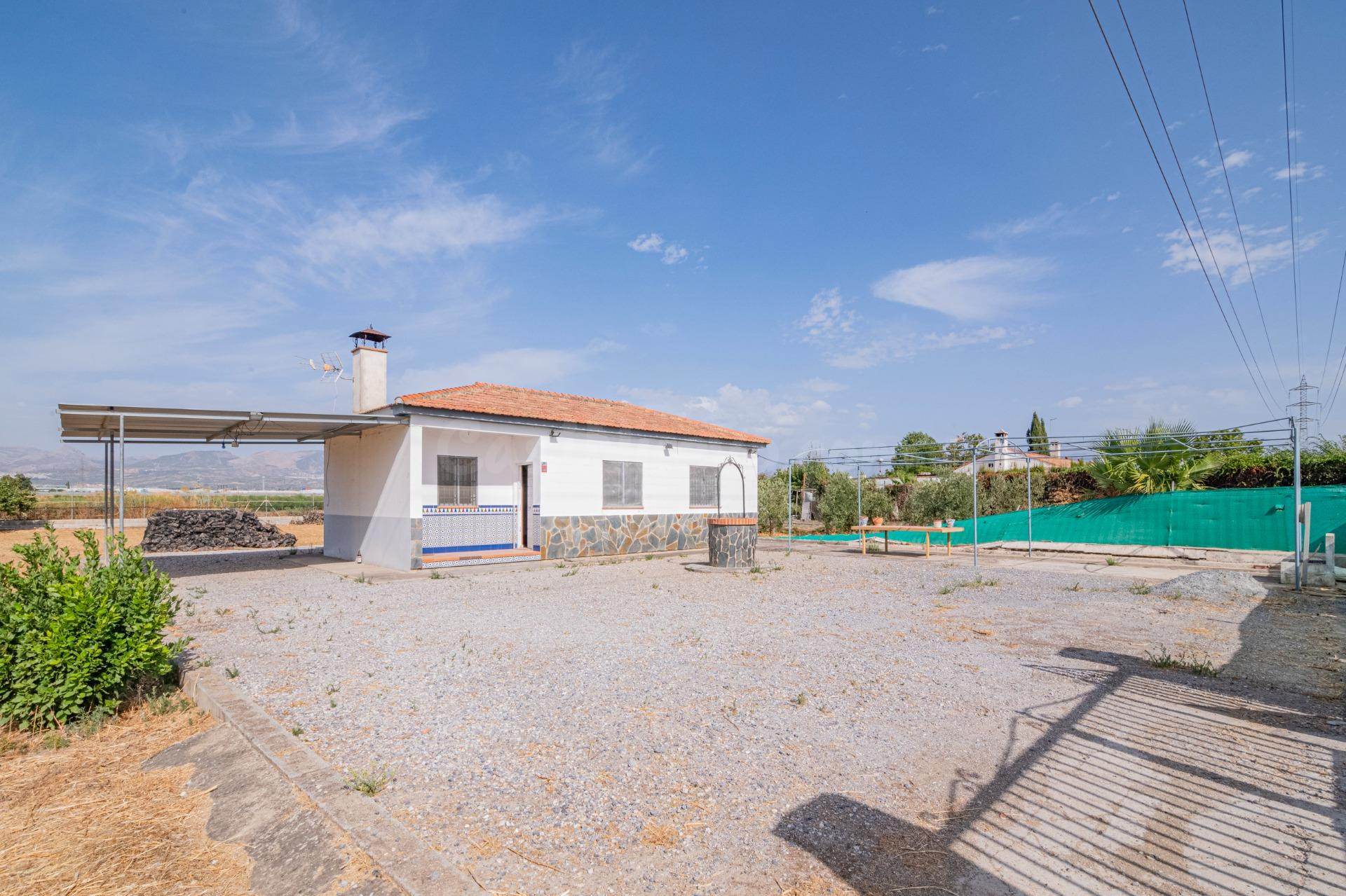 PRECIOSO TERRENO RUSTICO CON CASITA EN URBANIZACION CANTO GR - foto 2