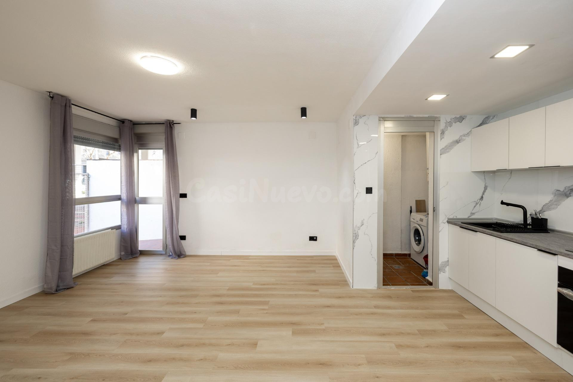 PLANTA BAJA CON TERRAZA PRIVADA, 3 DORMITORIOS, 2 BAÑOS Y GARAJE