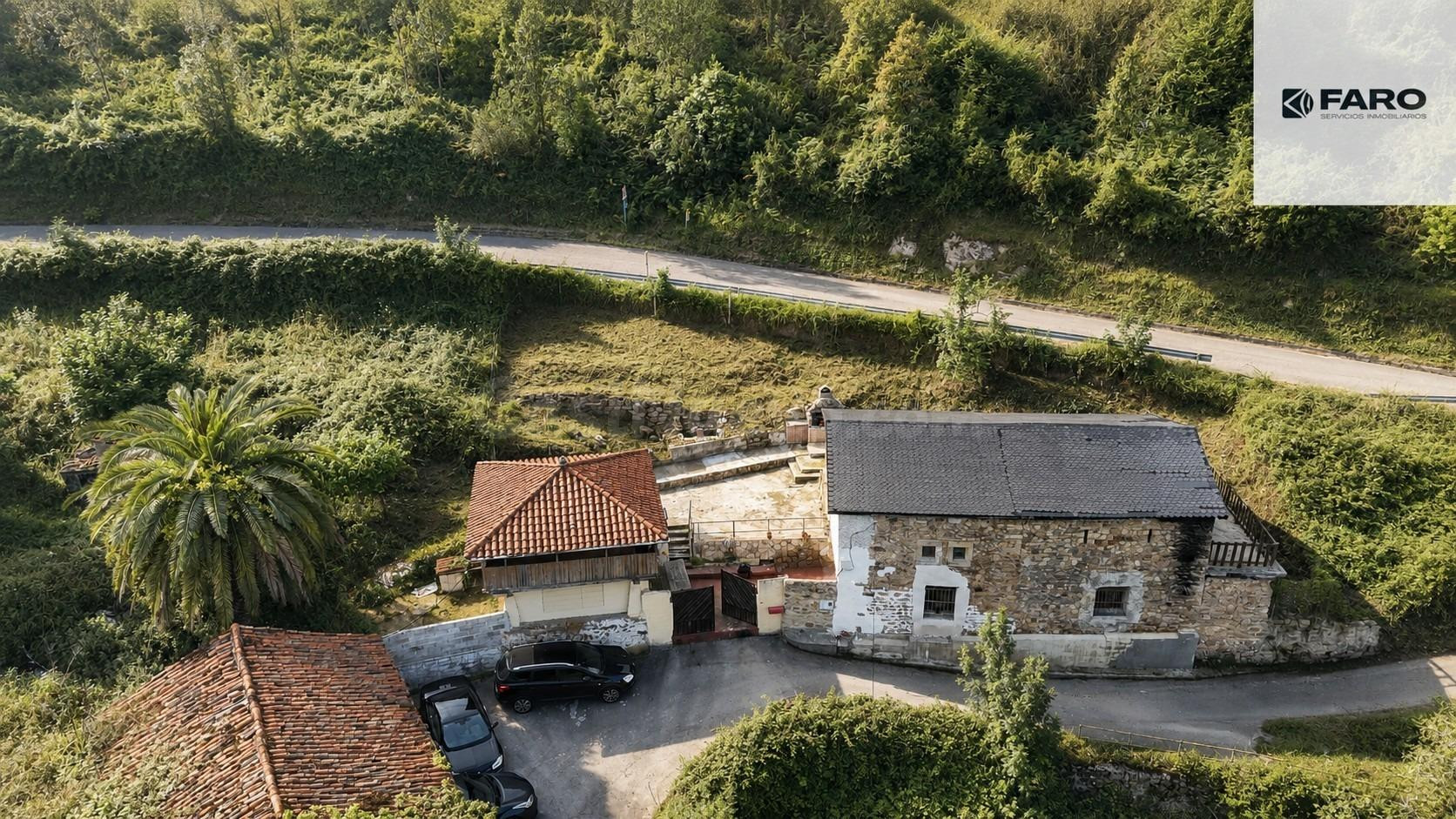 Casa con terreno, hórreo y entorno natural en Peón - foto 3